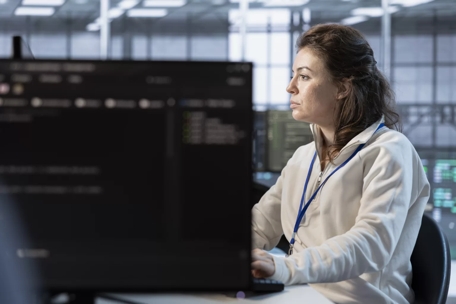 Bluefinch-esbd - woman using pc integrating new technologies systems data center